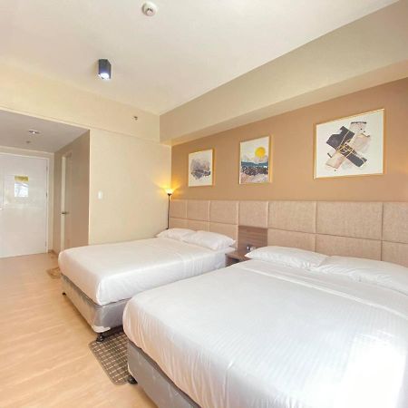 セブ市 Twin Bed Unit- Migas Haven At Sunvida Towerアパートホテル エクステリア 写真