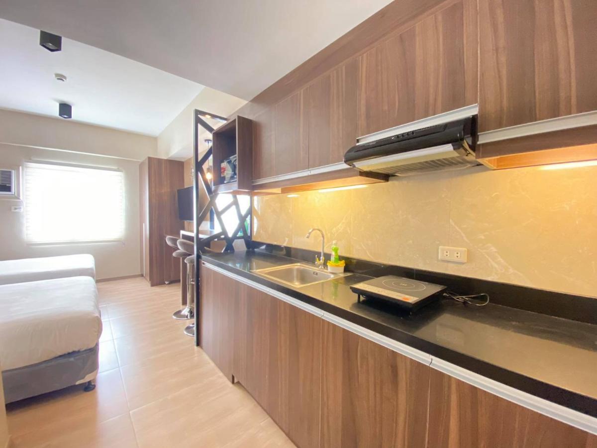 セブ市 Twin Bed Unit- Migas Haven At Sunvida Towerアパートホテル エクステリア 写真