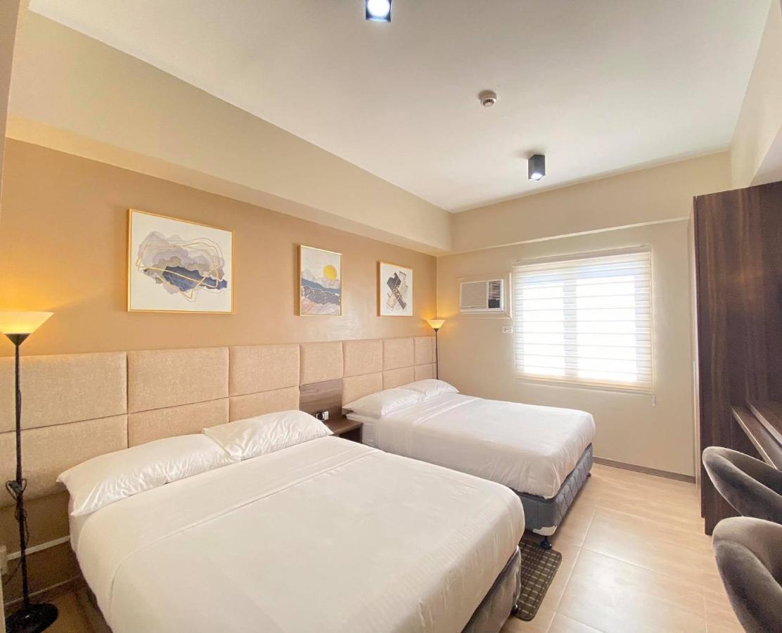 セブ市 Twin Bed Unit- Migas Haven At Sunvida Towerアパートホテル エクステリア 写真