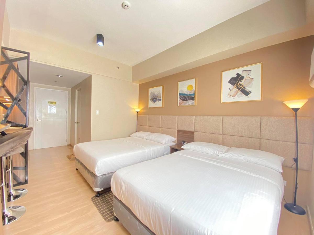 セブ市 Twin Bed Unit- Migas Haven At Sunvida Towerアパートホテル エクステリア 写真